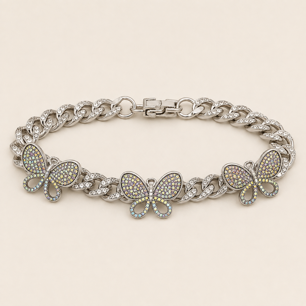 Diamond Butterfly silver Cuban anklet with three iridescent crystal butterfly charms on luxury ivory background