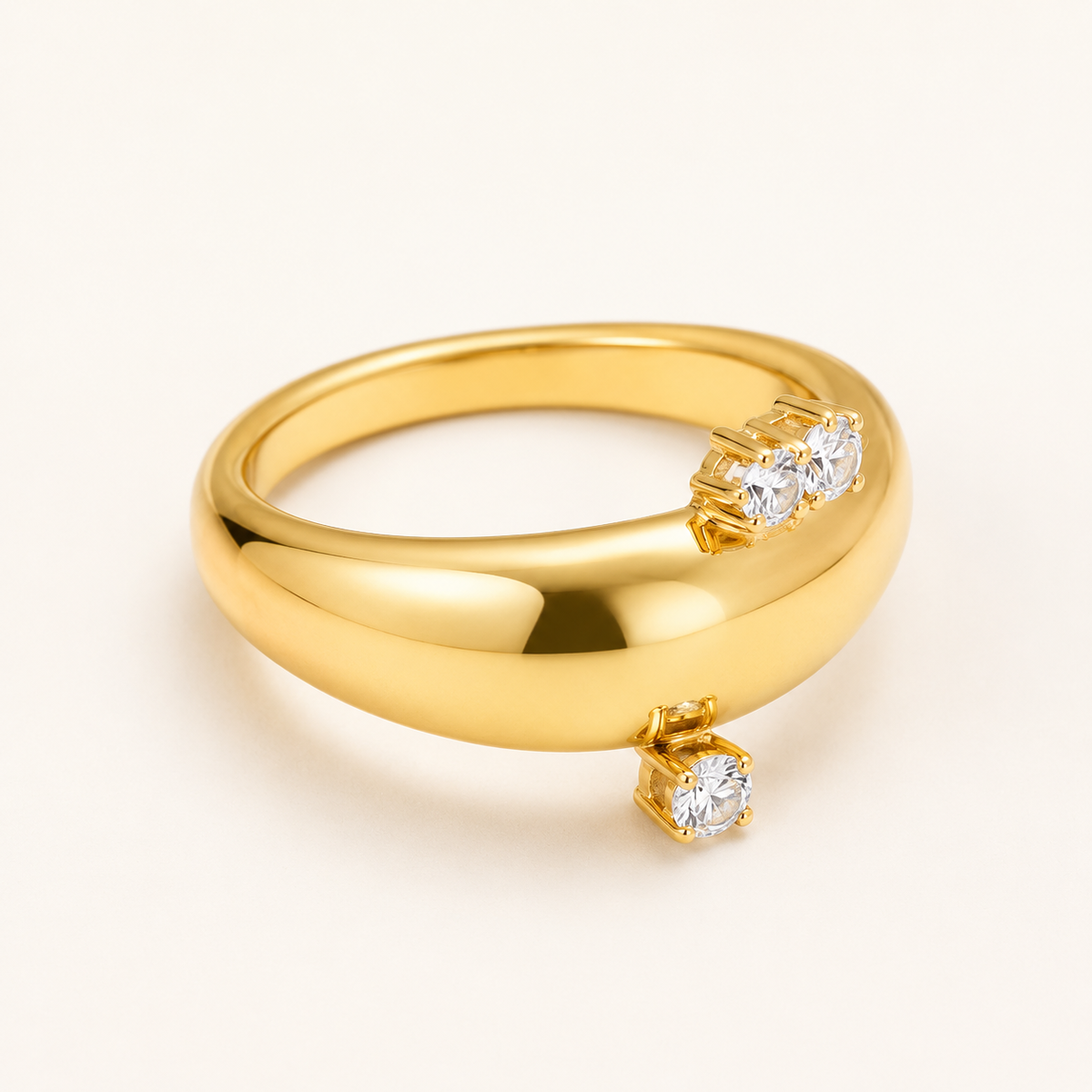 Elliverse gold open zircon ring on a luxury white studio background