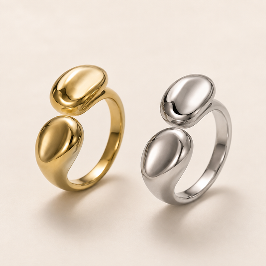 Metal Wrap Ring Collection in gold and silver on a luxury ivory background