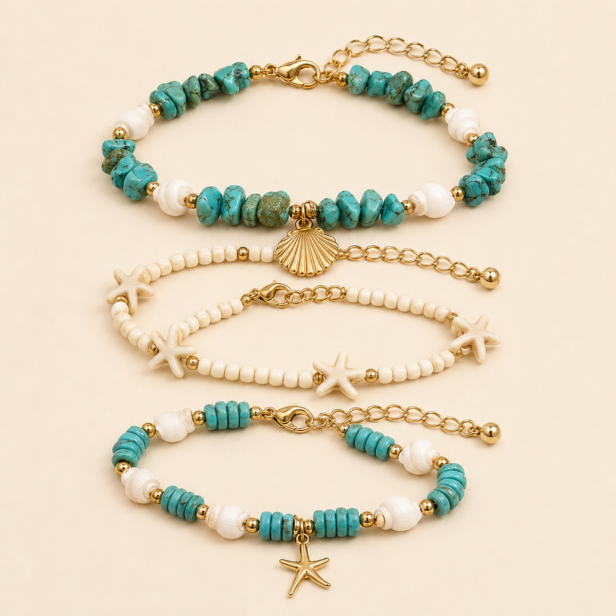 Three ocean-inspired turquoise, shell and starfish anklet styles on warm ivory