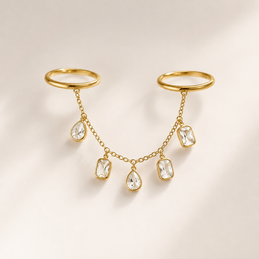 Tassel Chain Ring on a luxury ivory studio background
