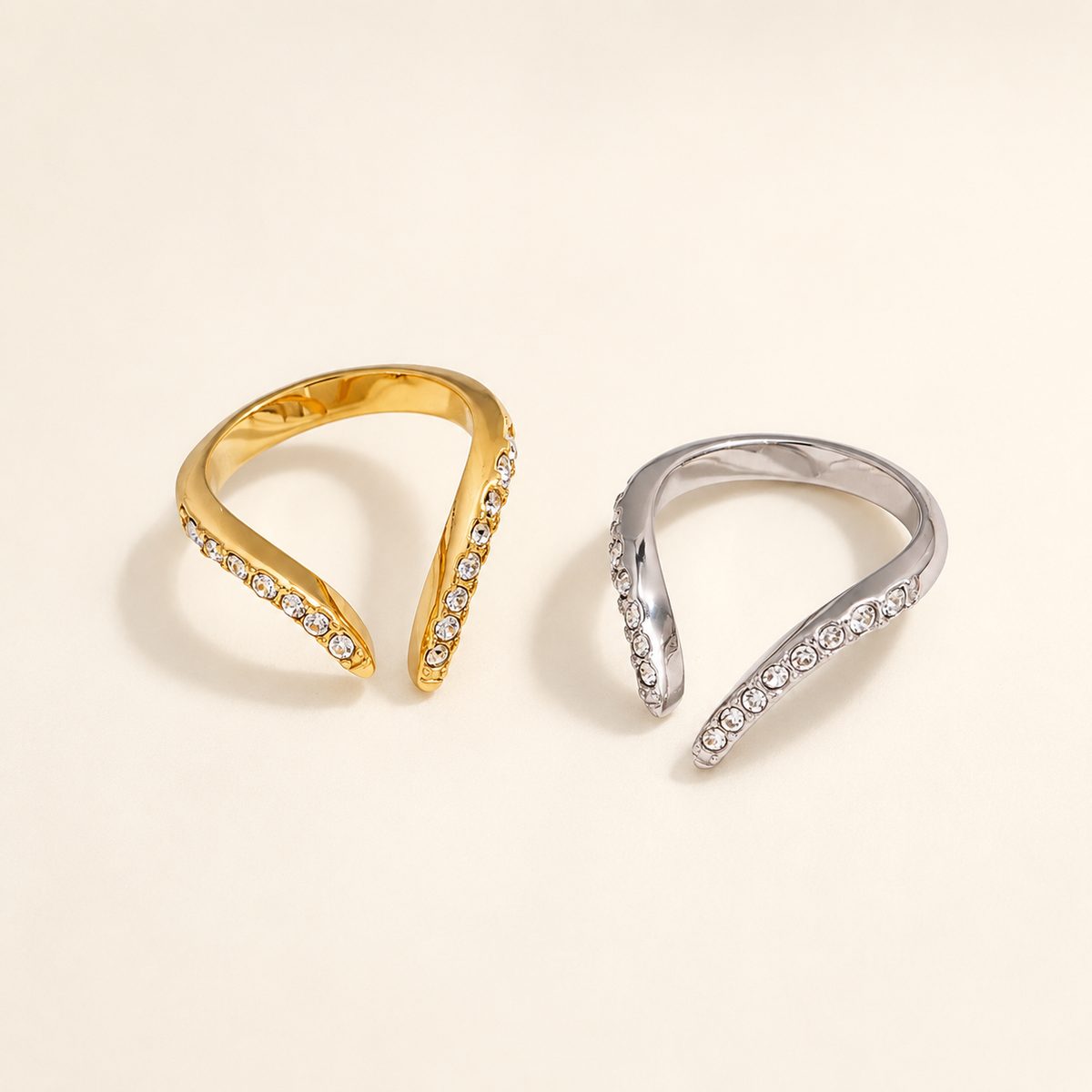 Gold and silver Zircon Open Rings on luxury ivory background